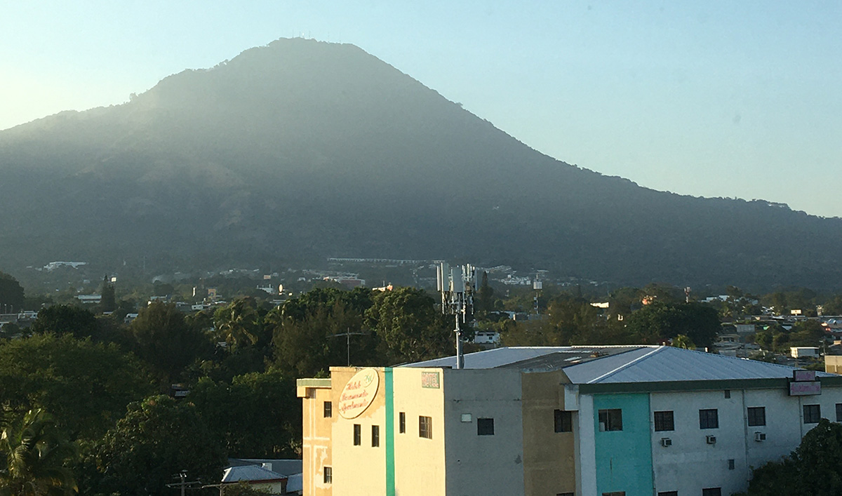 A volcano overlooking a town in El Salvador