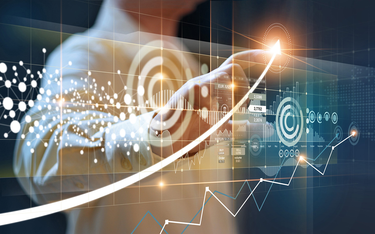 A businessperson interacting with a financial data overlay showing an upward trend